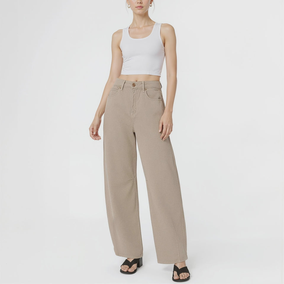 woman wearing Kallie relaxed curve jeans in mocha casual outfit with minimalist top